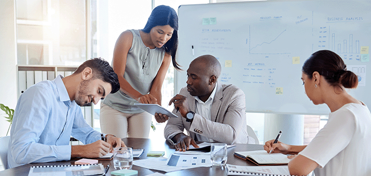 Planning, innovation and business people in a meeting for marketing sales strategy, ideas and risk assessment. Leadership, mentor and African ceo coaching, working and helping employee our vision Director